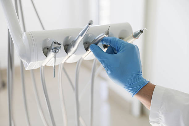 Professional Tooth Extraction technician working in Malakoff, TX